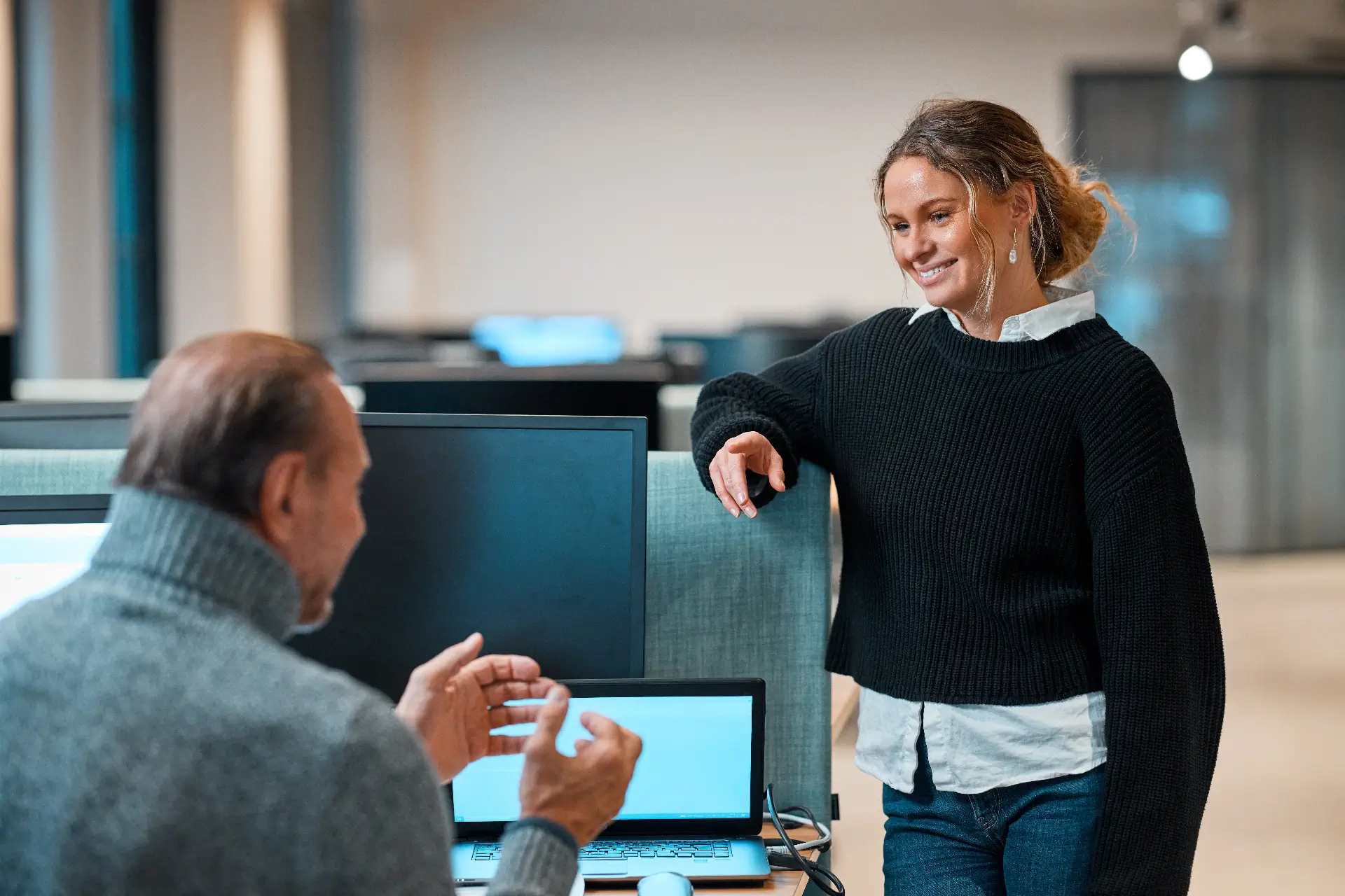 Two colleagues planning together with a tablet